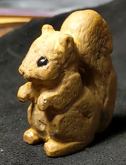 squirrel stone carving